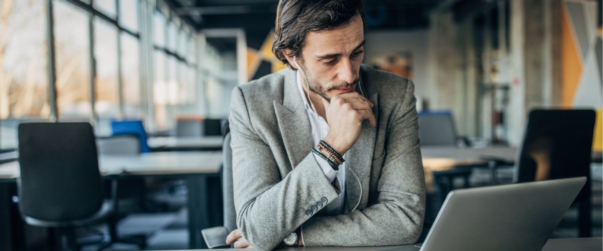 Business man attending evergreen webinar