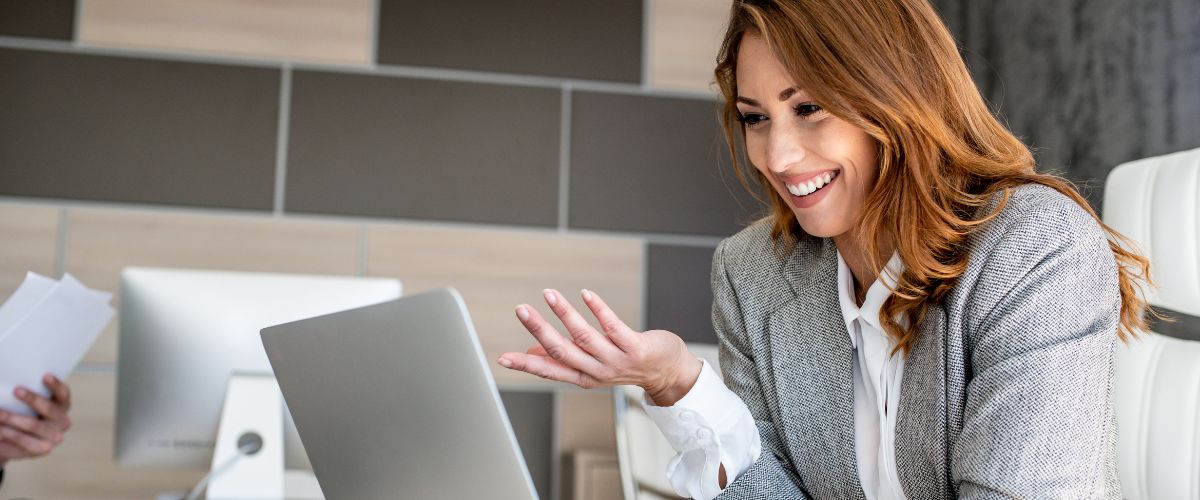 Business woman talking online