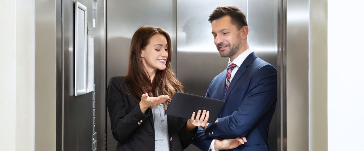Couple doing elevator pitch