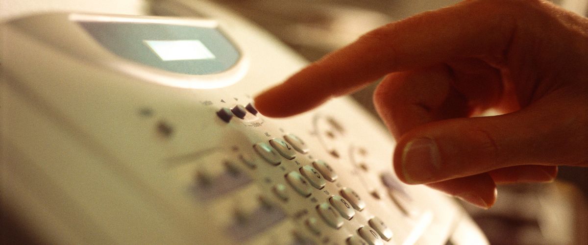 Dialing a number on fax machine