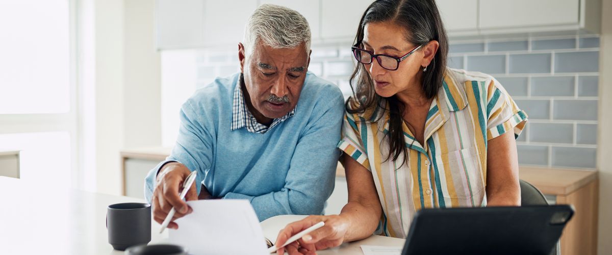 Senior couple reviewing finances