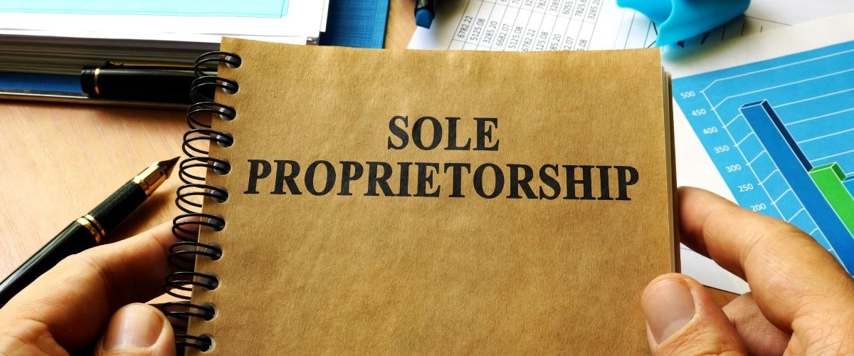 Sole proprietorship written on book cover