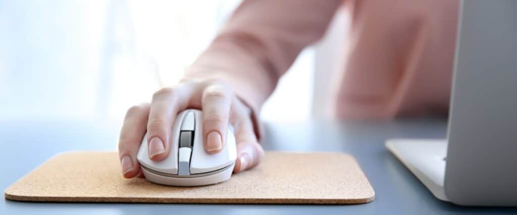 Woman using a computer mouse