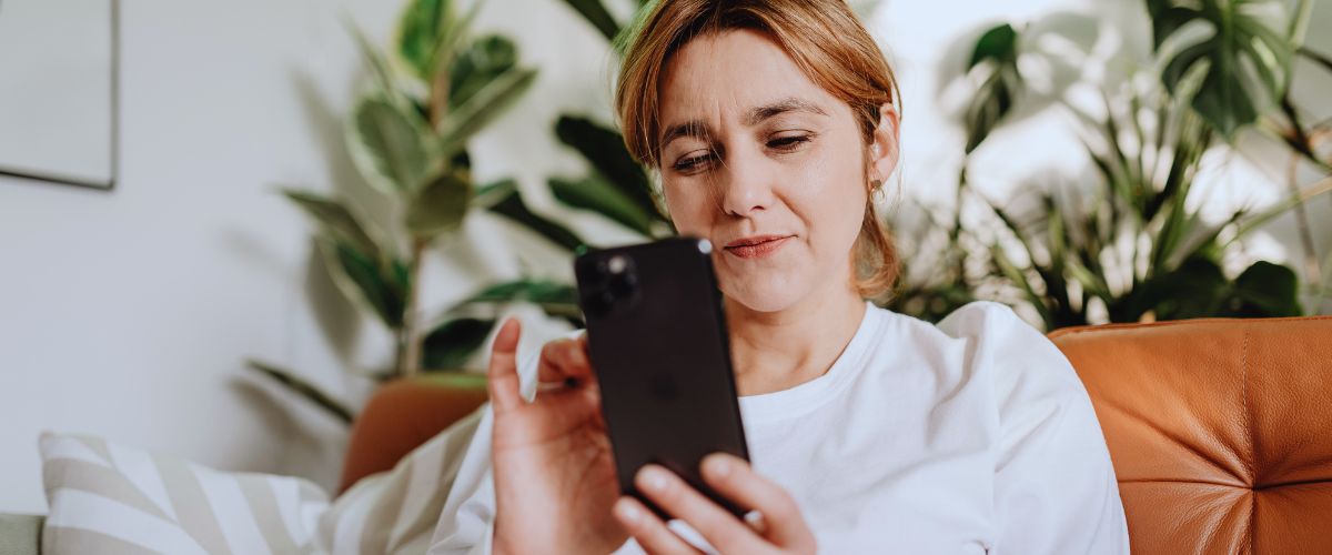 Woman using parental control app