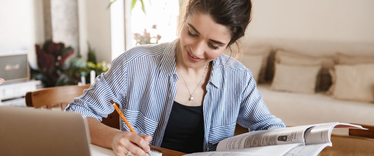 Young woman studying at home